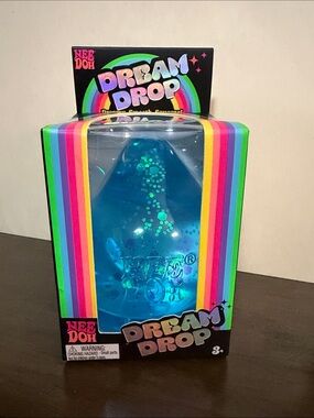 NIB- NeeDoh Dream Drop Blue Glitter with Splash Display Stand